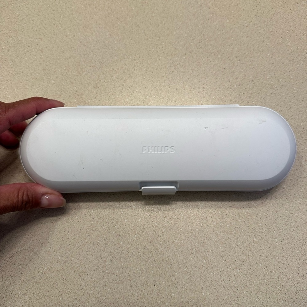 PHILIPS Sonicare Toothbrush travel case on white.